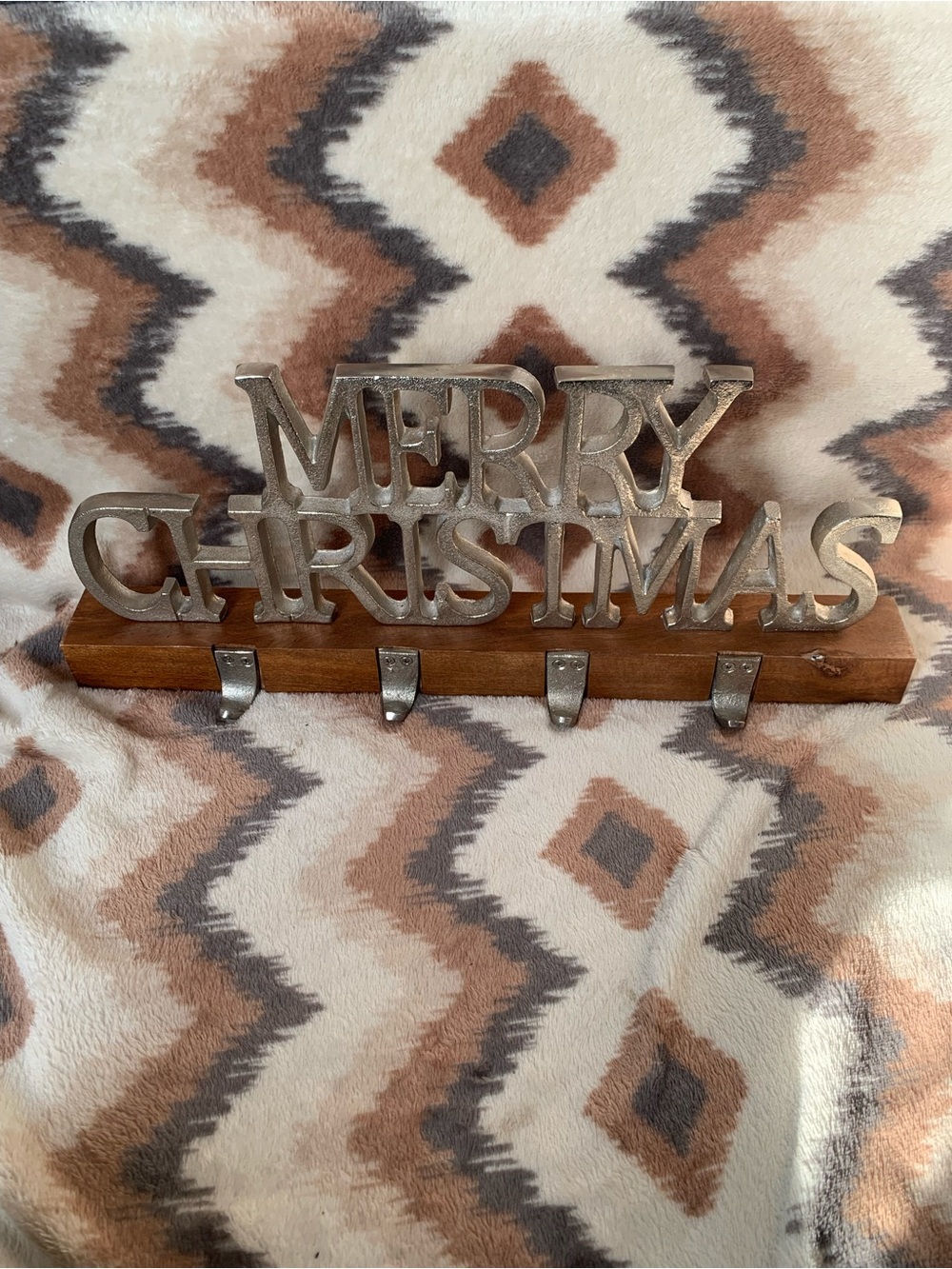 Merry Christmas stocking holder with a wooden stand